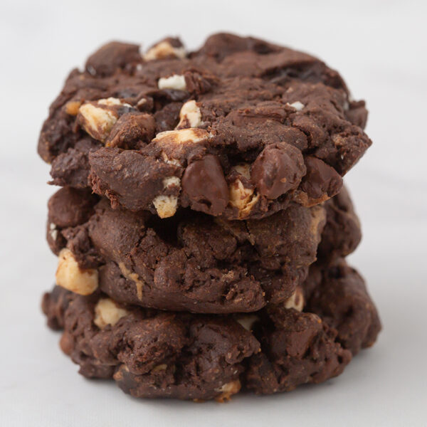 Image of 3 double shot espresso chocolate chip cookies stacked on one another.